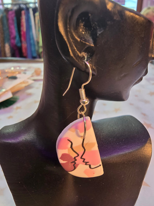 Wild reef earrings abstract face